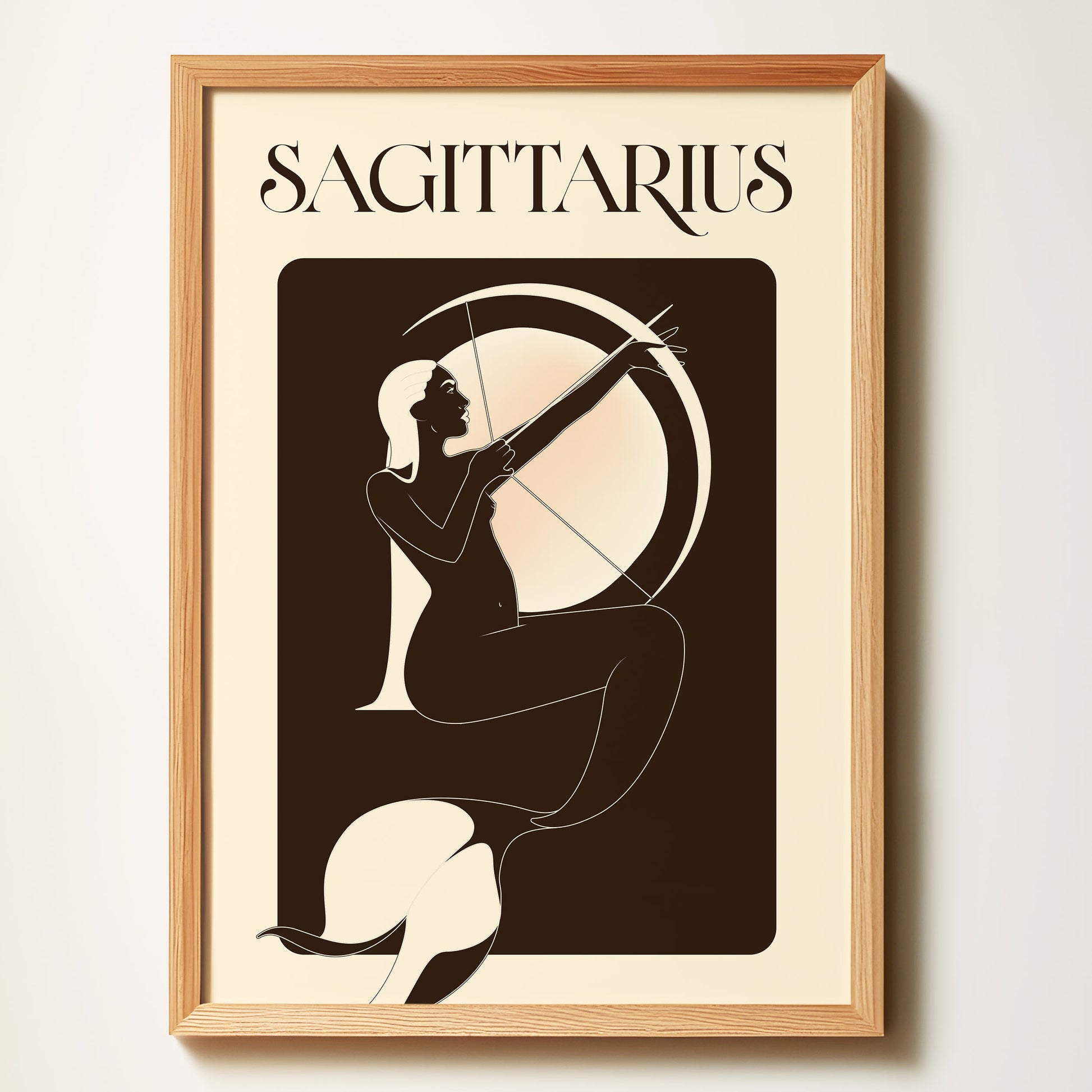 Framed artwork of Sagittarius zodiac sign with silhouette of a archer on a beige background