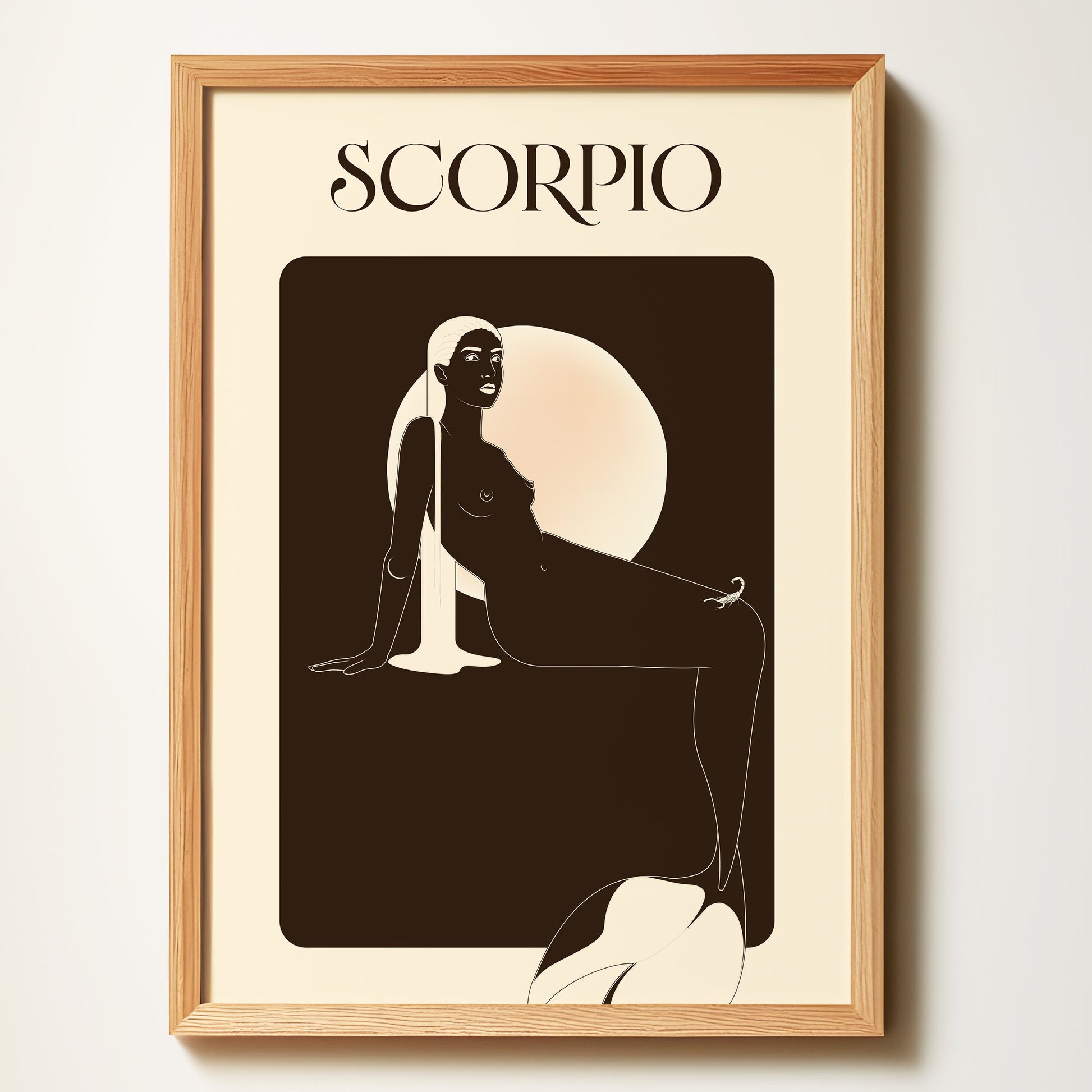 Framed artwork of a Zodiac mermaid silhouette with 'SCORPIO' text on a beige background
