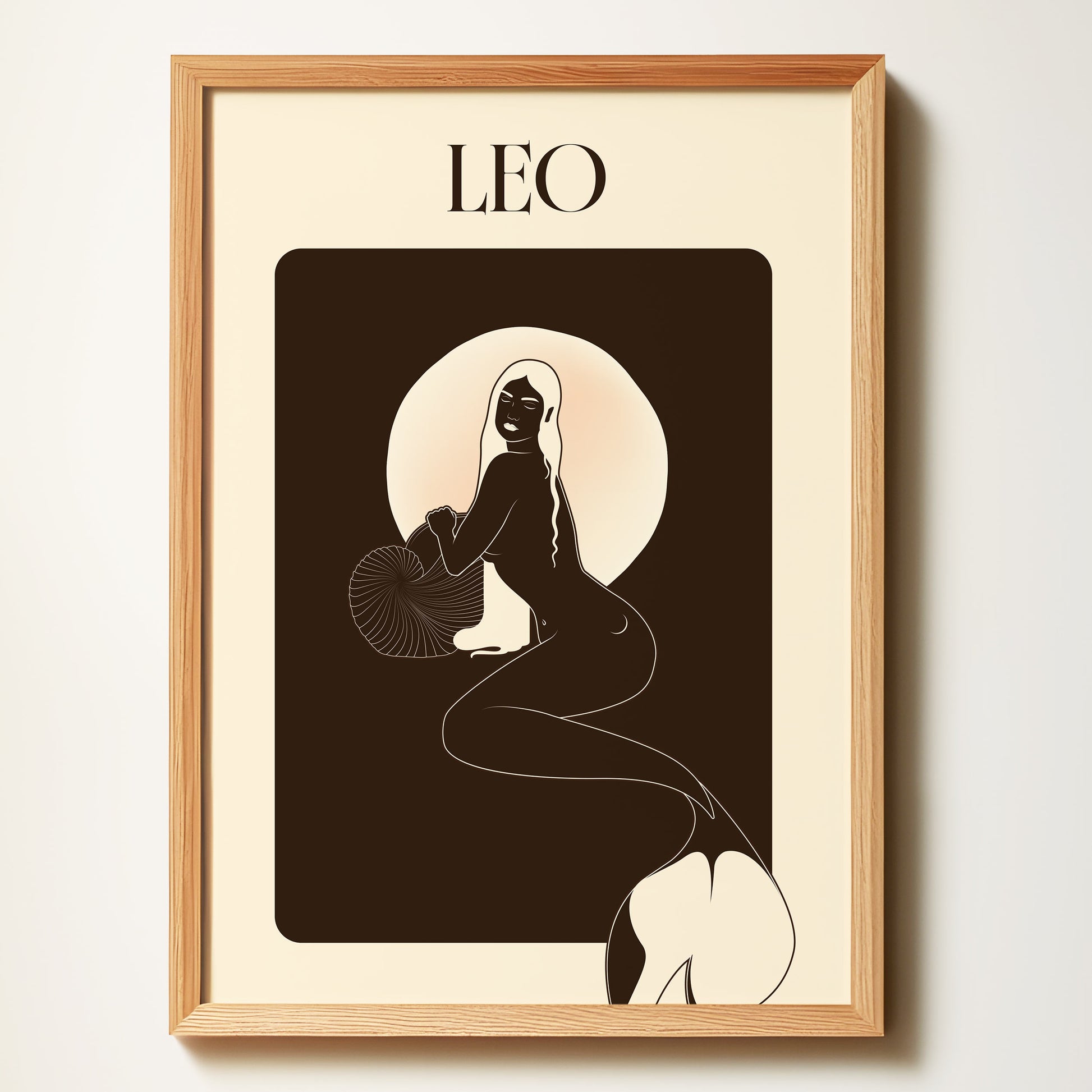 Framed artwork of a silhouette with 'LEO' text against a beige background