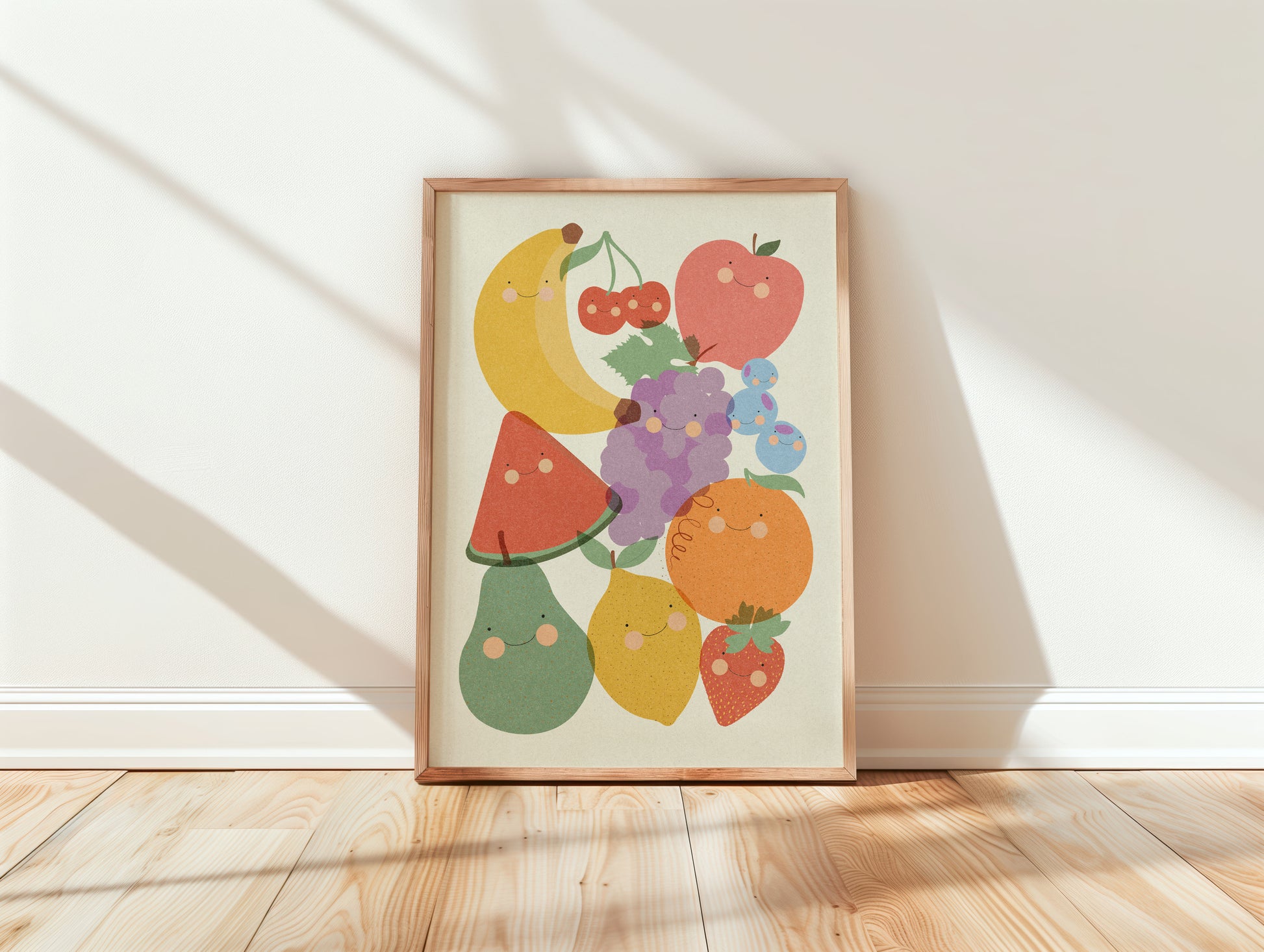 Framed colorful fruit illustration on a white wall.