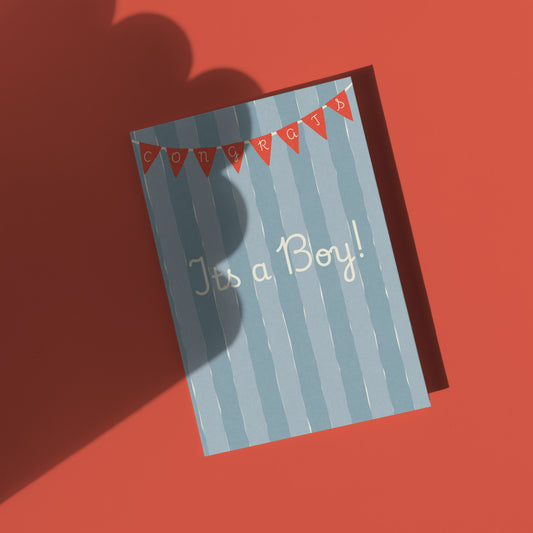 Baby shower card with 'Congratulations It's a Boy!' text on a striped background