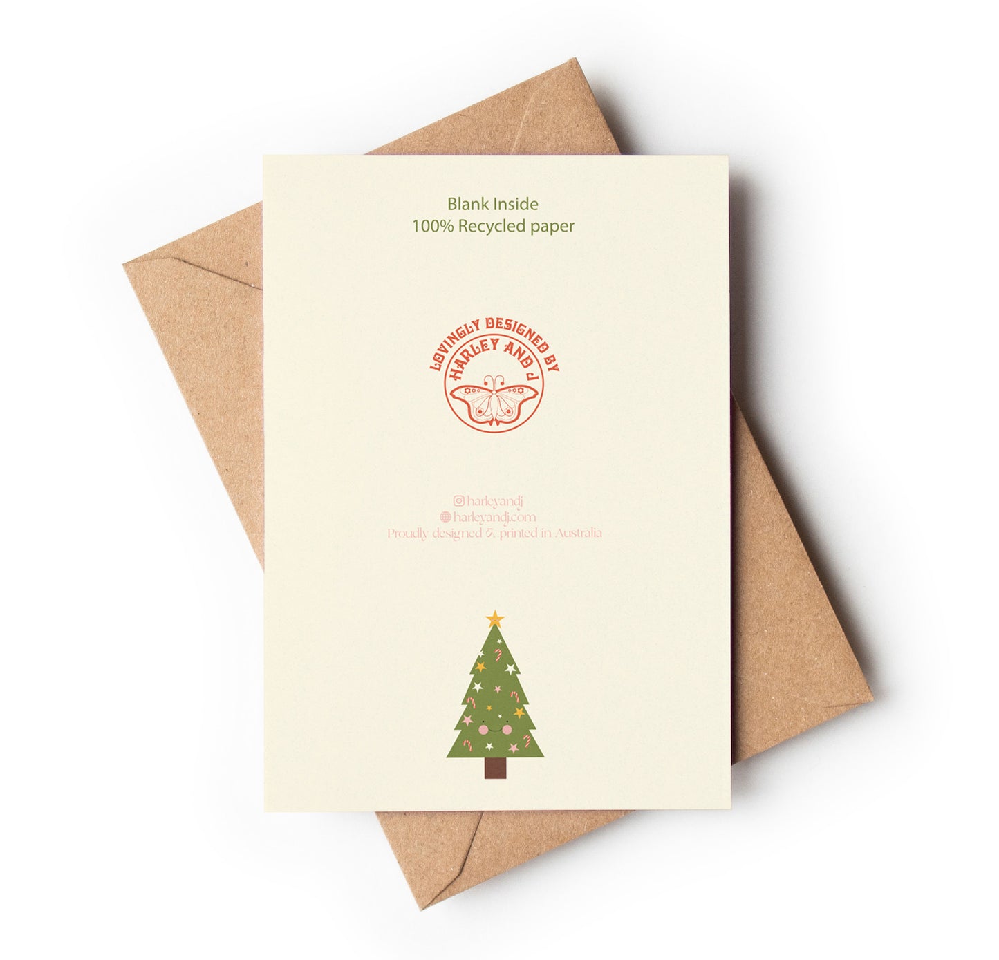 Back of Card with Christmas tree design and brown envelope on white background