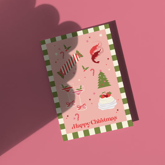 Christmas-themed card with festive illustrations on a pink background