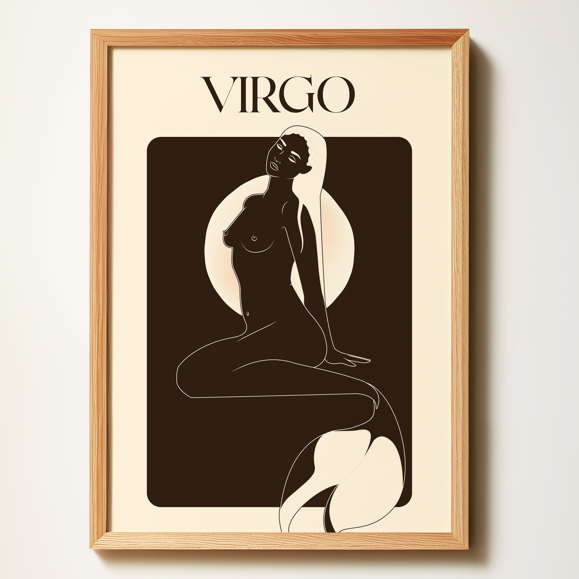 Framed artwork of a silhouette with 'Virgo' text on a beige background